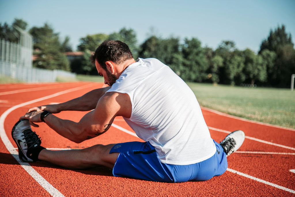 Athlete stretching after training – The Aurivo Recovery Ritual